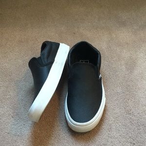 Black van slip on sneakers